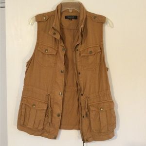 Trixxi safari vest, size medium, rust colored with pockets and drawstring waist